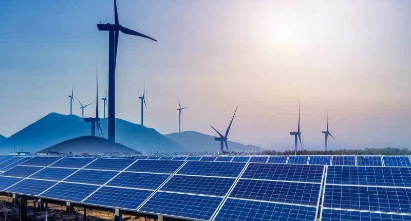 Wind turbines with the sun in the background