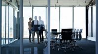 People negotiating in a meeting room