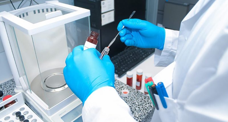 Theratechnologies image of a lab technician handling samples