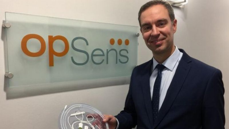 OpSens Inc. - President & CEO, Louis Laflamme, holding the OptoWire.