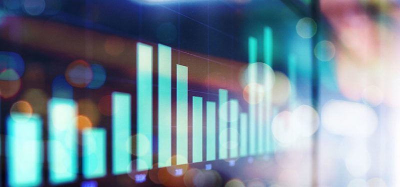 Graph on screen showing up and down stock market numbers