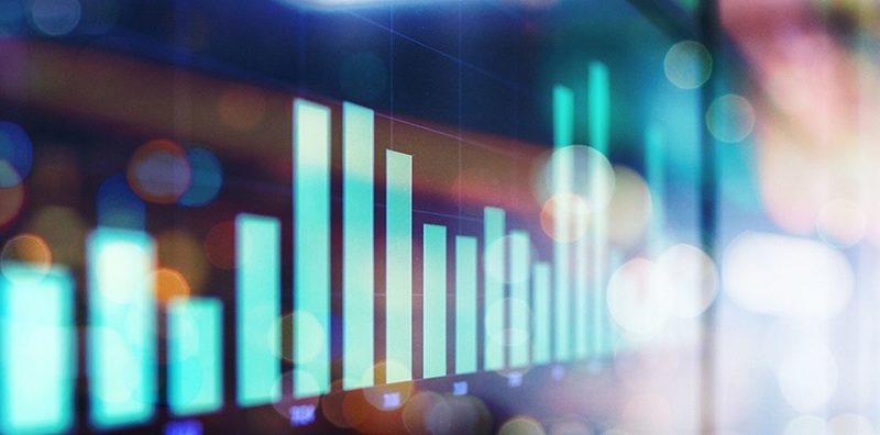 Graph on screen showing up and down stock market numbers