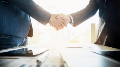 two businessmen shaking hands