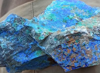 Max Resource - Copper and silver mineralization at the URU district in 2022.