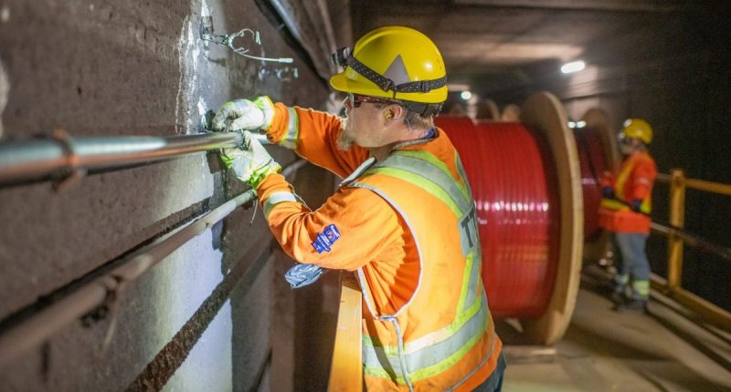 TTC electrician working on Rogers network installation