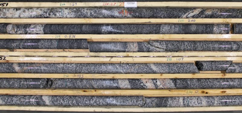 Hole Ranger 01, core boxes 51 & 52 showing mineralized interval 225.5 to 234.48m of granitoids crosscutting massive gabbrodiorite.