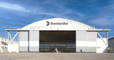 Bombardier's Paris maintenance station with a jet parked inside.