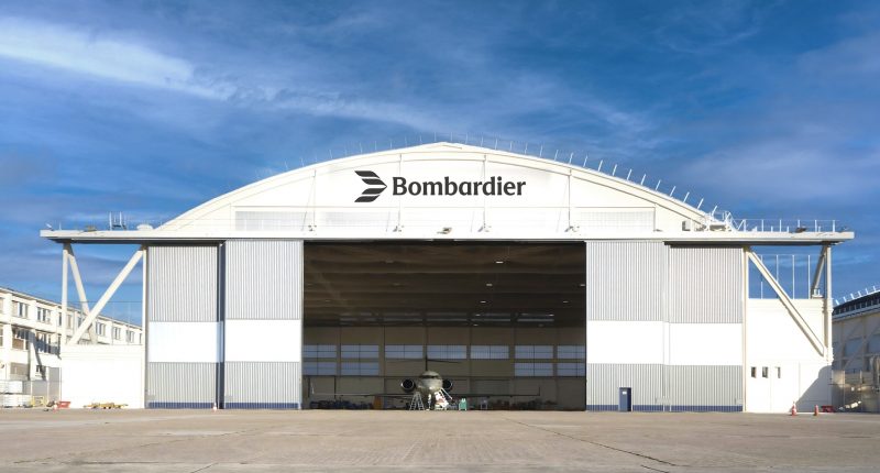 Bombardier's Paris maintenance station with a jet parked inside.