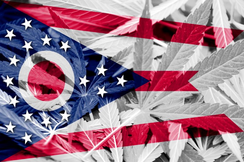 The Ohio state flag superimposed with cannabis leaves.