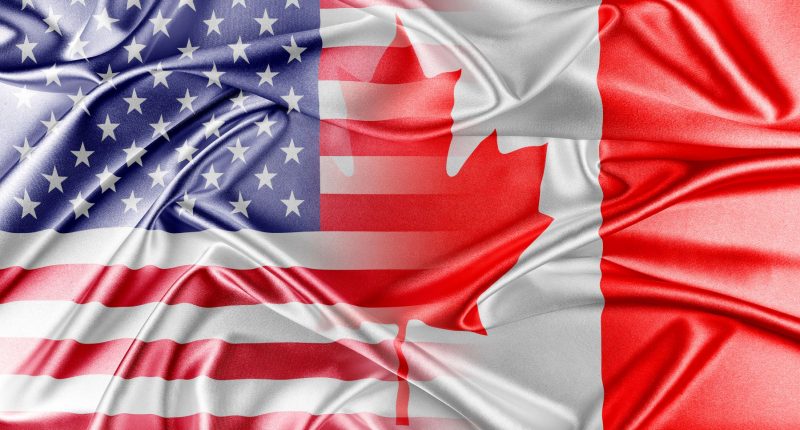 U.S. and Canadian flags merging