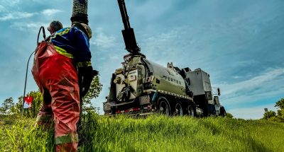 Vertex environmental consultants and hydrovac operators assisting with a critical water main break in Calgary in June 2024.