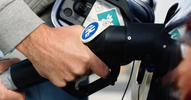 A hydrogen vehicle at a refueling station