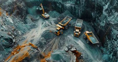 A modern mining operation with heavy machinery and mining trucks