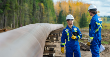 ATCO employees at a pipeline