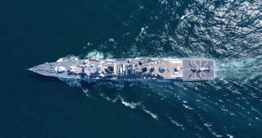 Aerial view of naval ship on the ocean