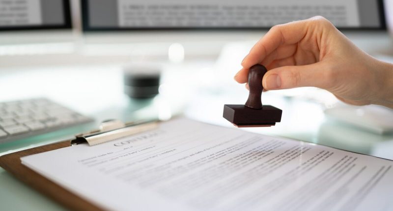 Hand stamping a document