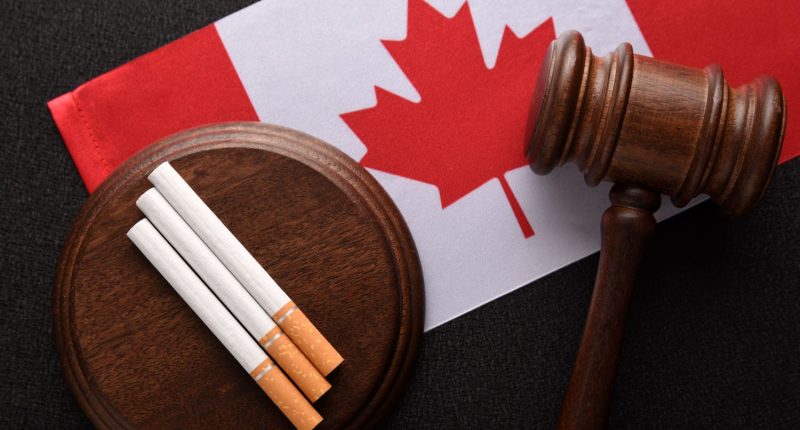 Flag of Canada, cigarettes and a gavel.