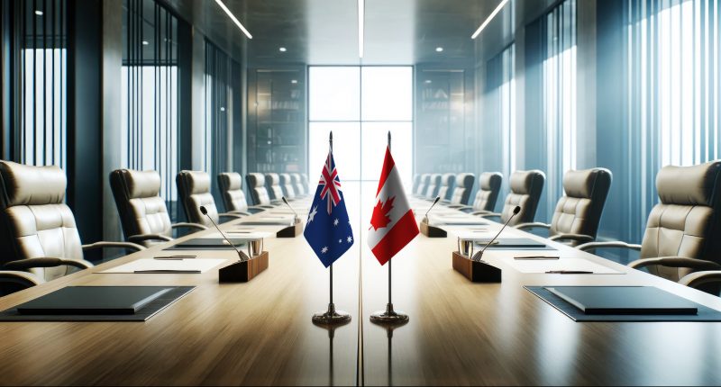 Australian and Canadian flags in a board room