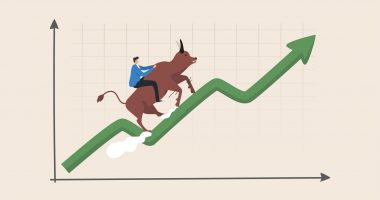 Man riding bull on a chart