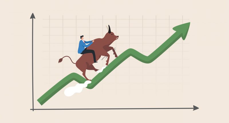 Man riding bull on a chart